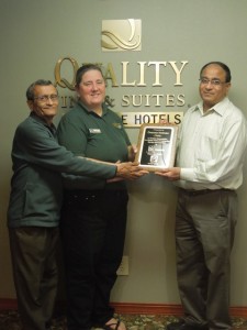 Pictured from left to right: J.T. Patel, owner, Deanna Holman, General Manager, Hasu Patel, owner